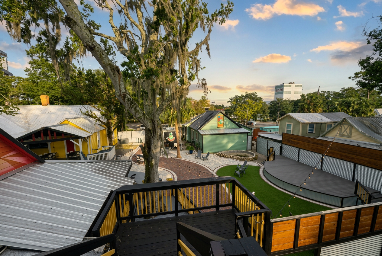 Aerial view of the Depot Village courtyard, oak canopy, stage and cottages from the upper deck
